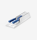White in-drawer knife block organizer holding two blue-handled kitchen knives
