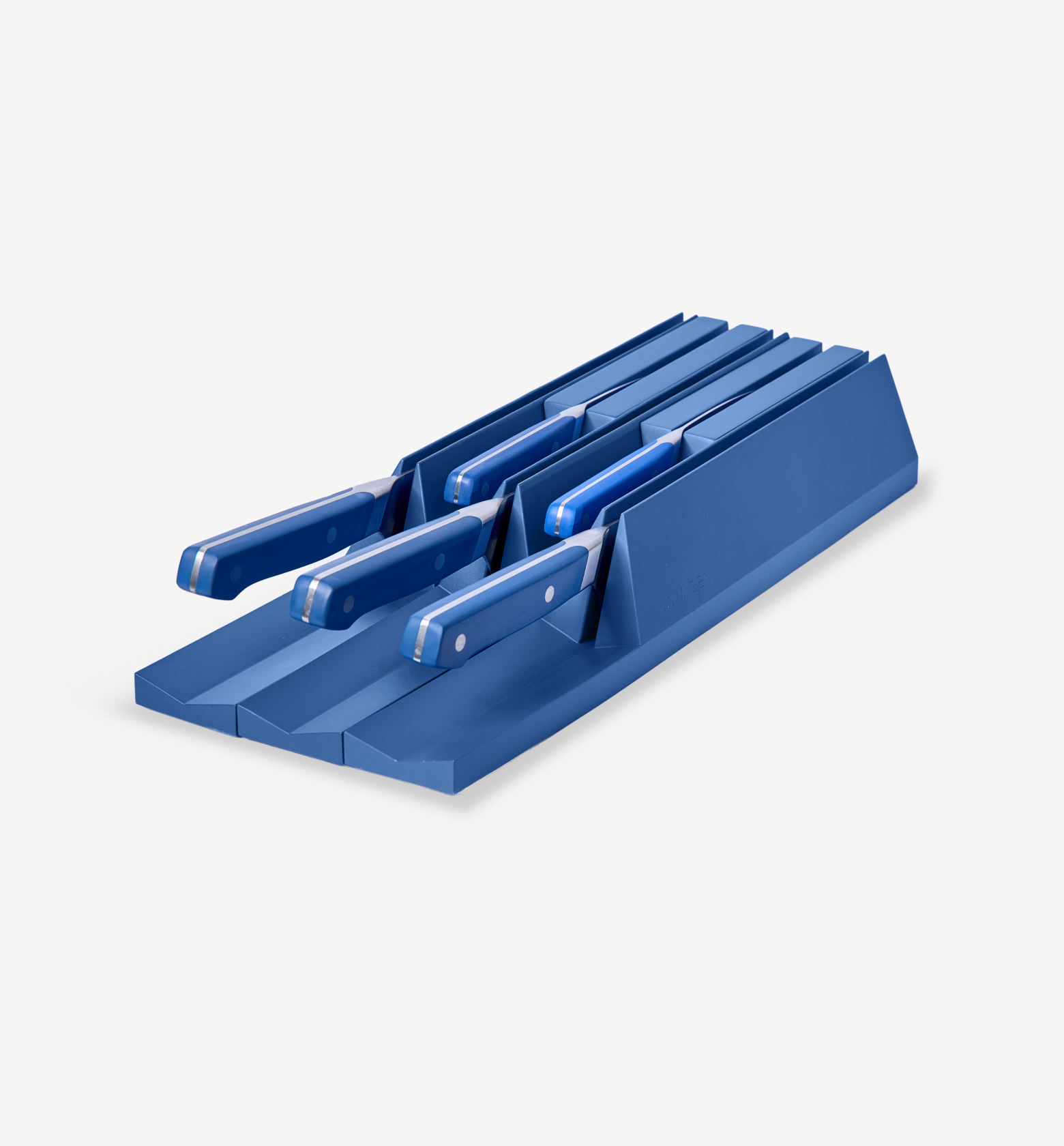 Blue knife drawer organizer block holding five matching blue-handled kitchen knives