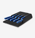 Steak knife set with blue handles in black drawer organizer tray