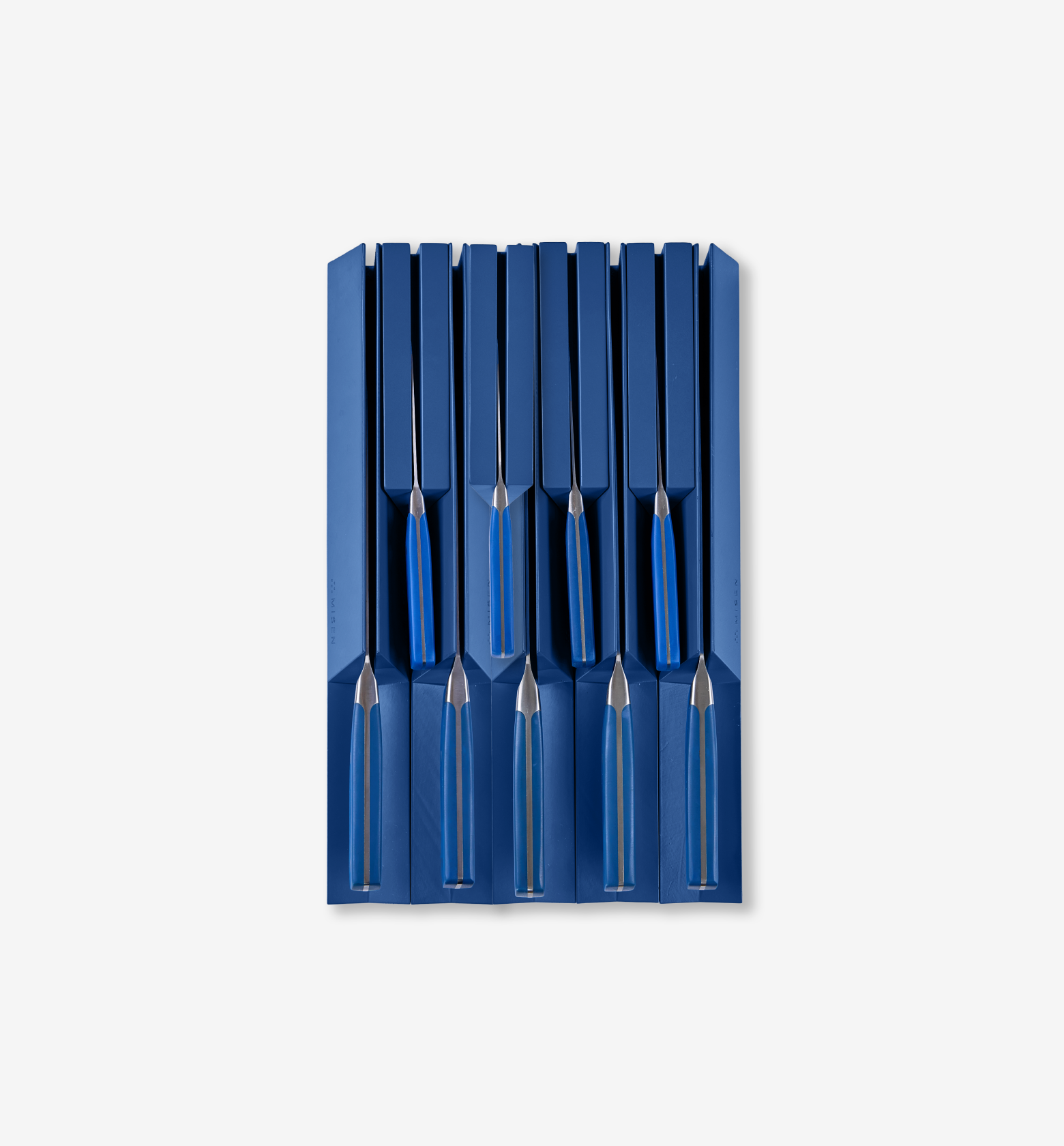 Blue knife block set with stainless steel knives and blue handles organized in slots
